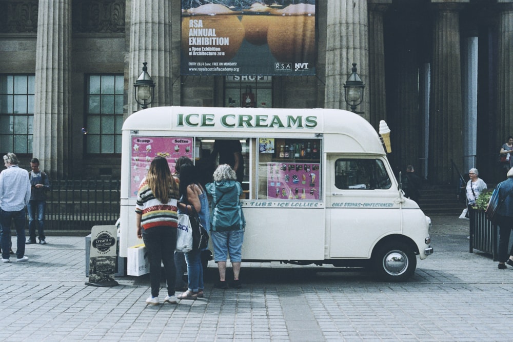 people lined up at ice cream truck