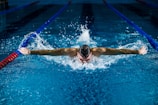man doing butterfly stroke