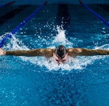 man doing butterfly stroke