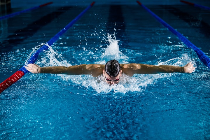 A swimmer in a pool lane