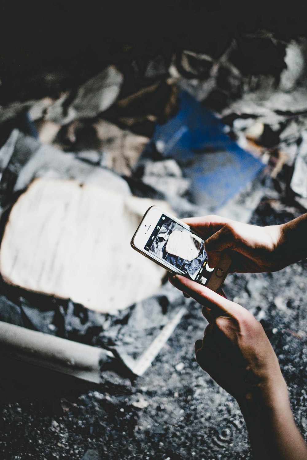 selective focus photography of person holding silver iPhone 6