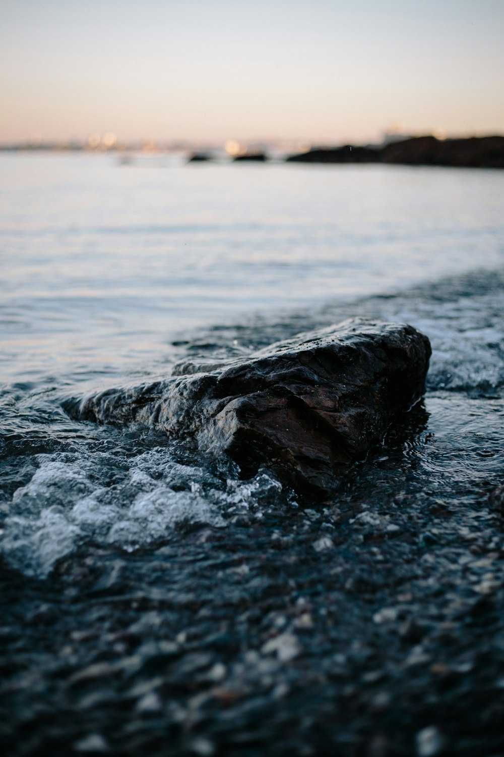 water hitting the rock on the coastline