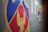 Close-up of a colorful display featuring various school emblems.