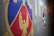 Close-up of a colorful display featuring various school emblems.