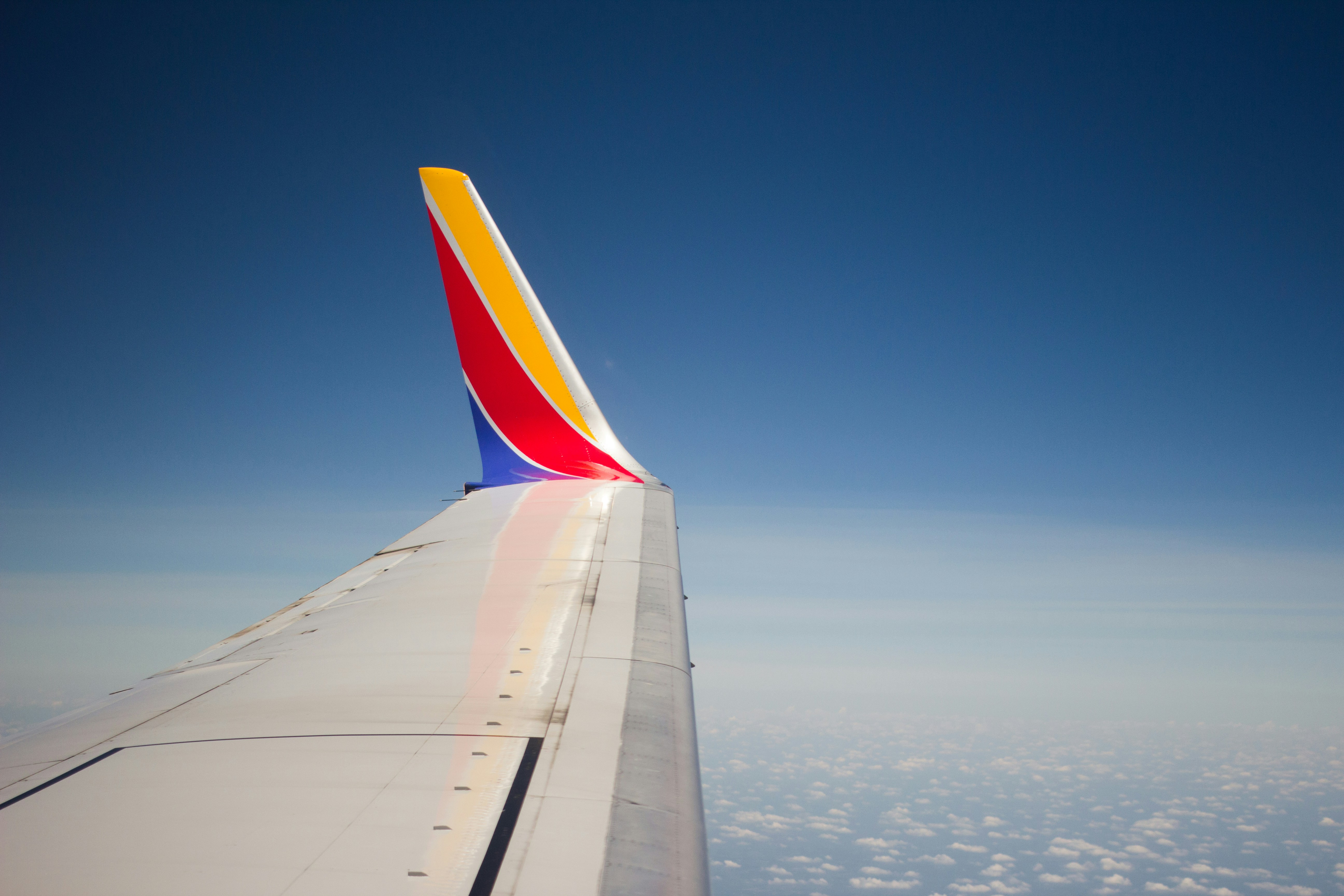white and red airplane wing aerial photography, Southwest Wing Tip on the Way To Columbus