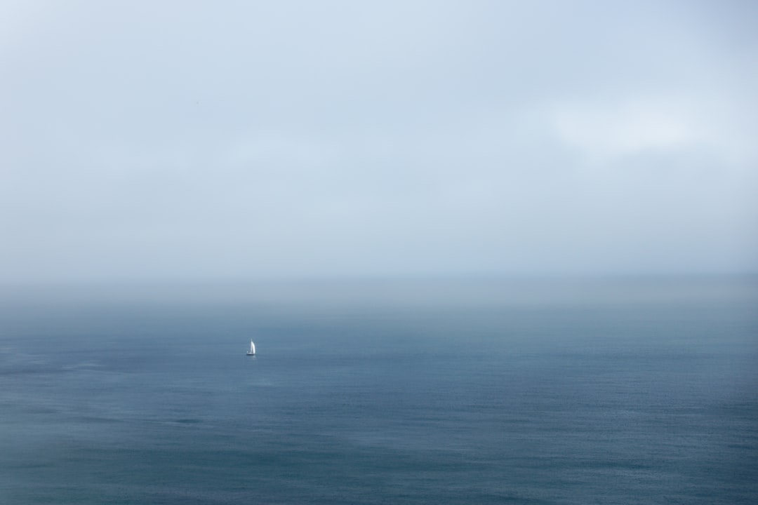 blue sea under white sky