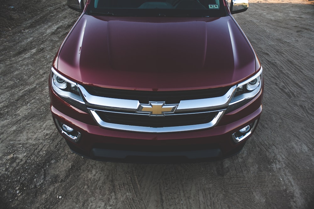 maroon Chevrolet vehicle in closeup photo