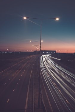 timelapse photography of road with street lights