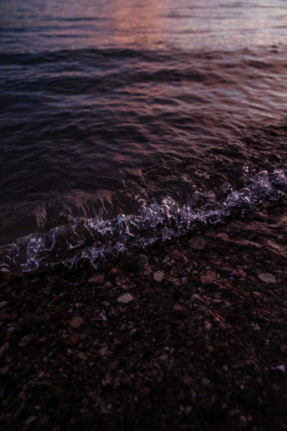 body of water during sunset