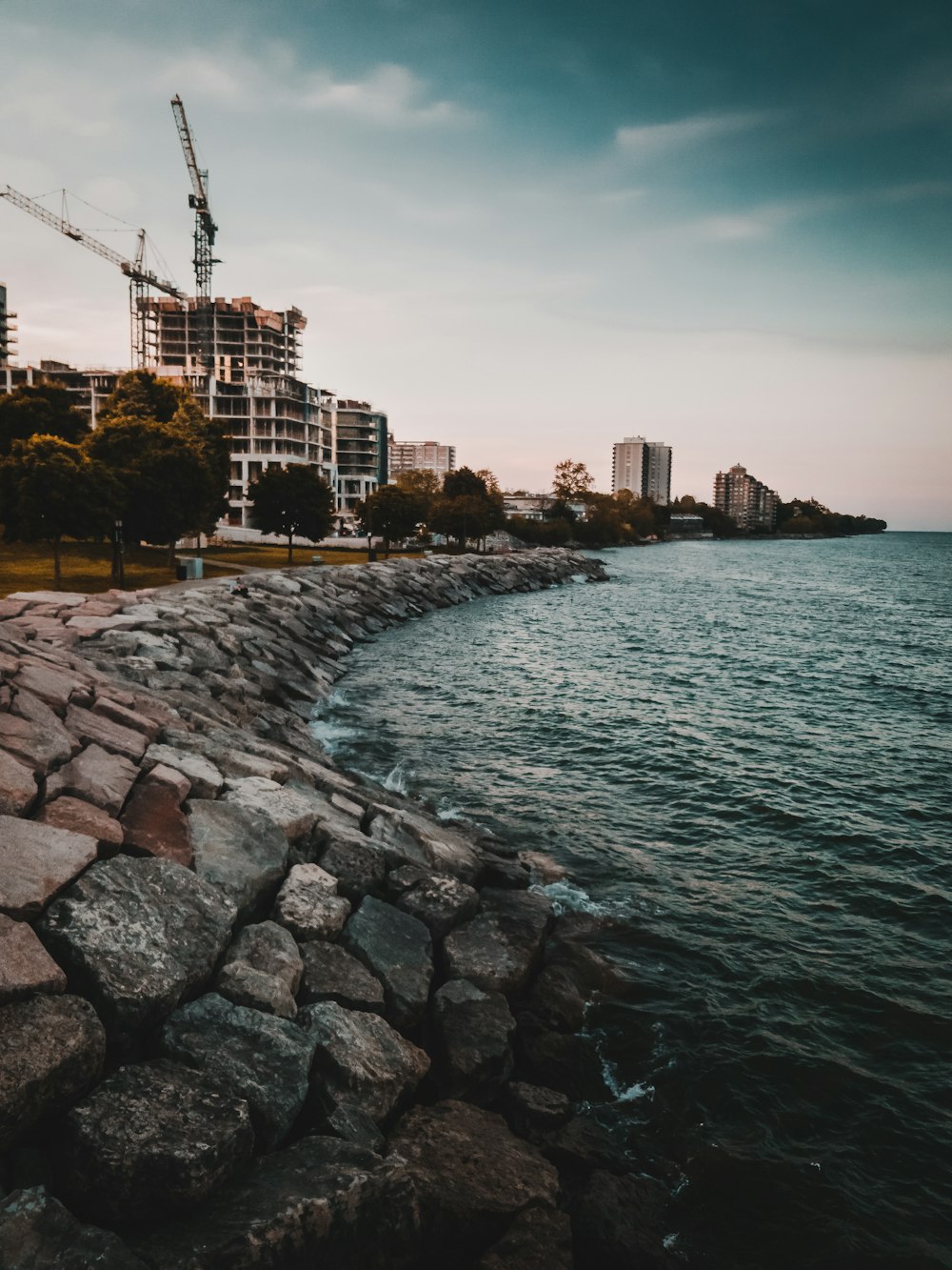 building beside sea under blue sky