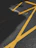 A close-up photo of freshly painted white road lines on an asphalt surface under bright sunlight.