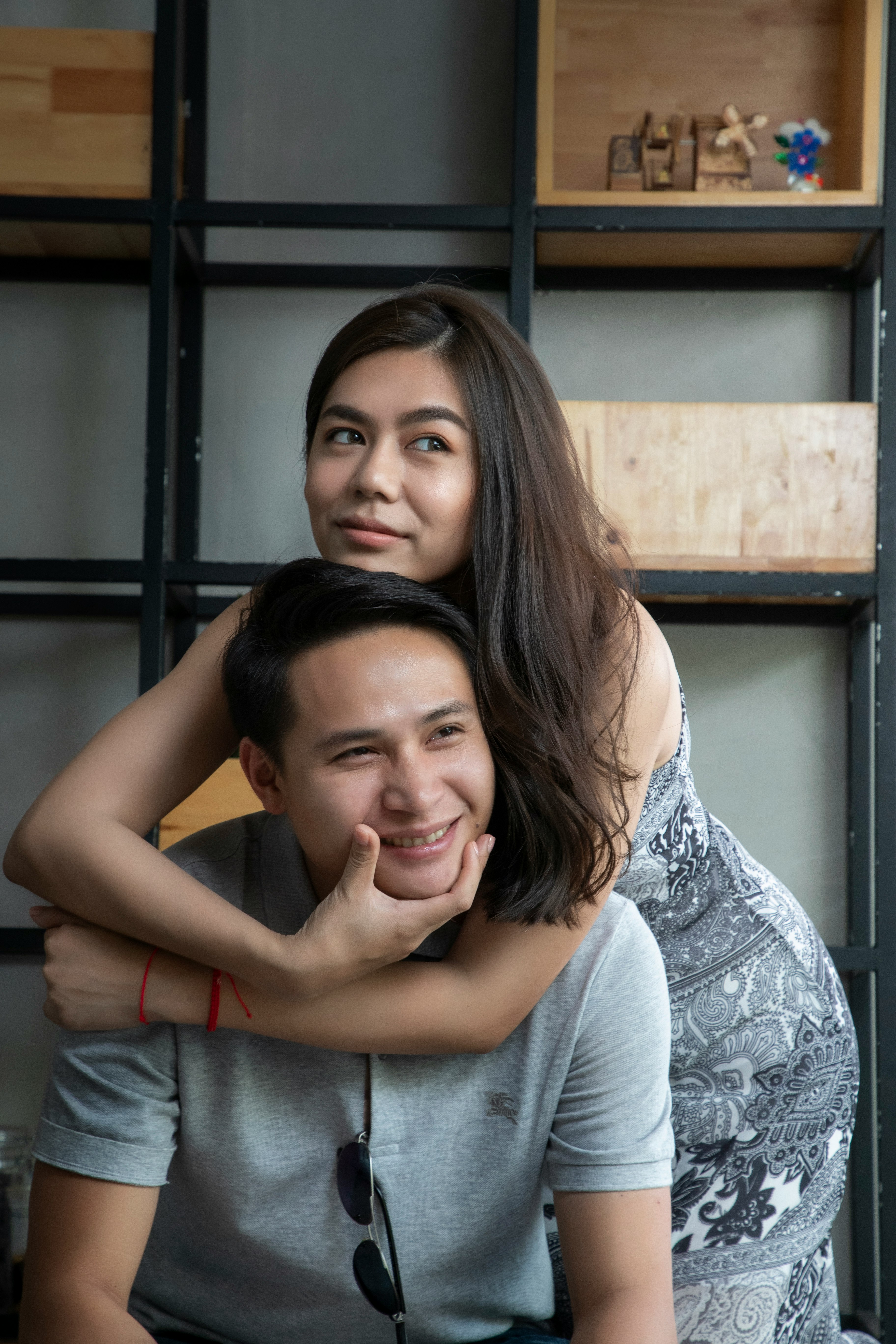 woman hugging smiling man