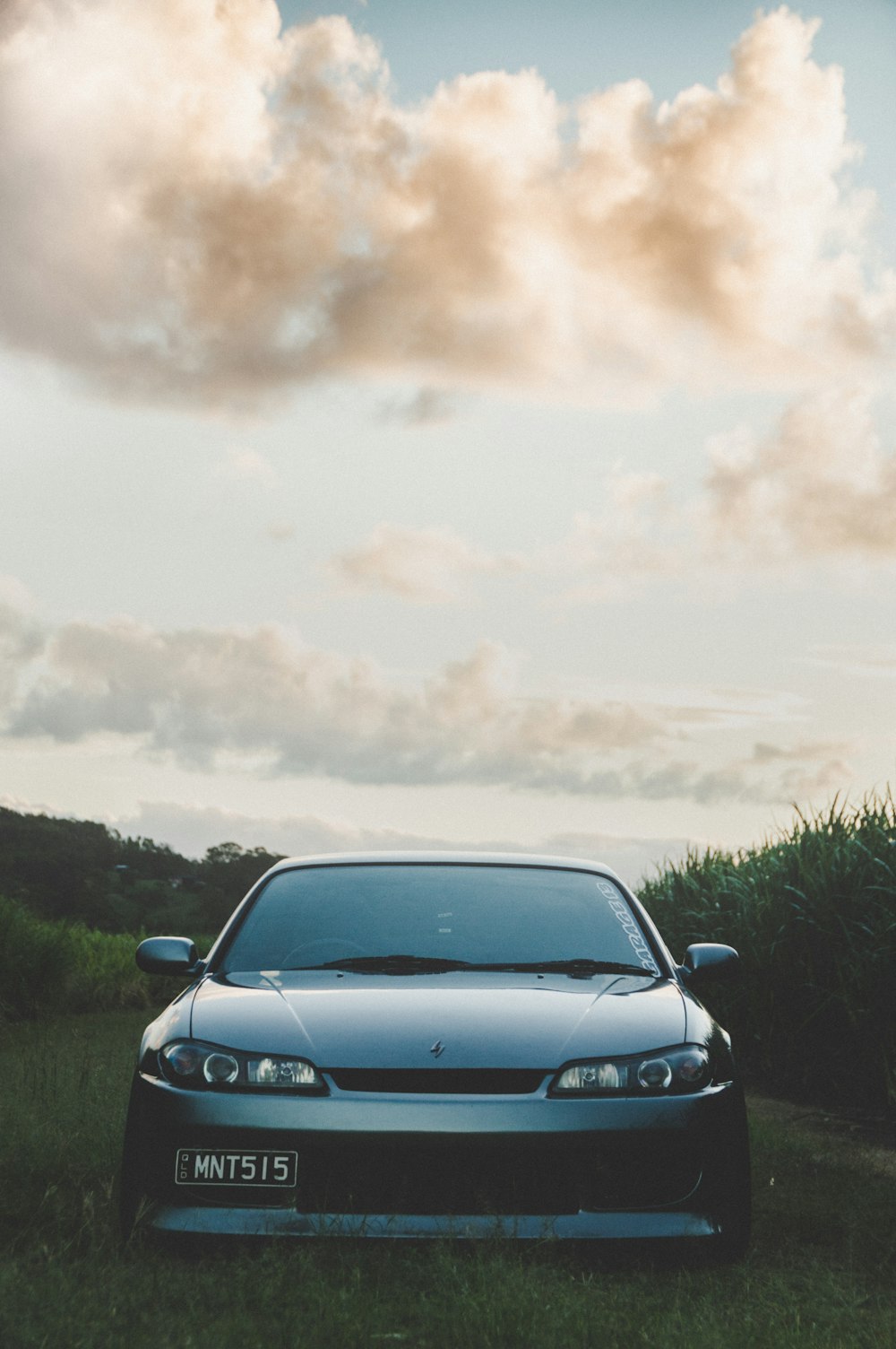 parked silver Nissan Silvia S15 during daytime