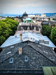 An aerial perspective of a commercial roofing project under inspection.