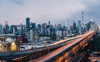 timelapse photo of road and bridge