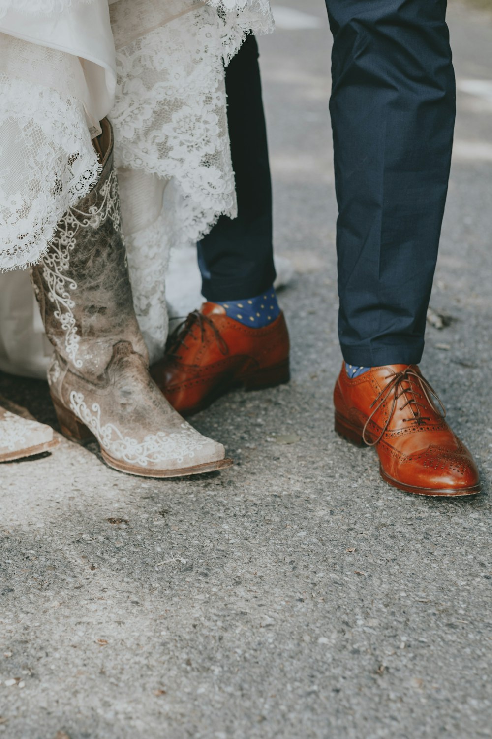 person wearing pair of brown leather dress shoes