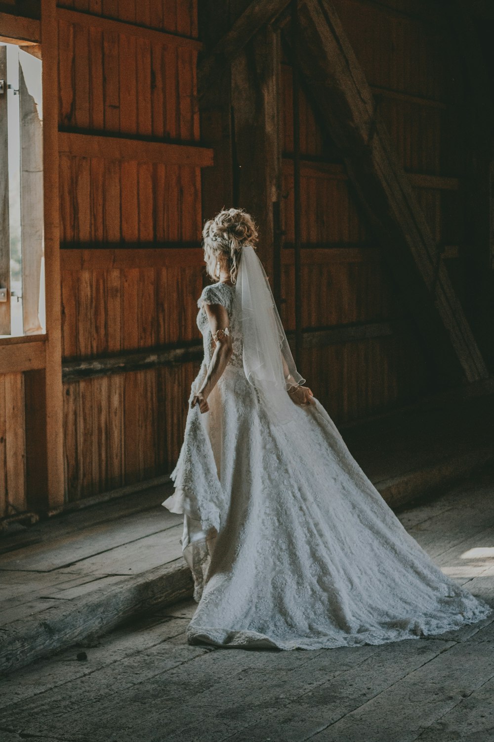 photo of woman in white wedding dress
