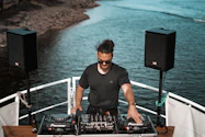 man holding mixing console