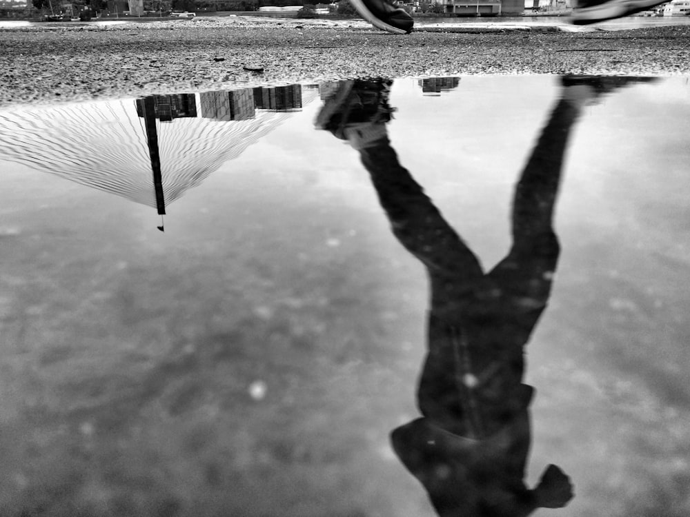 man walking on road