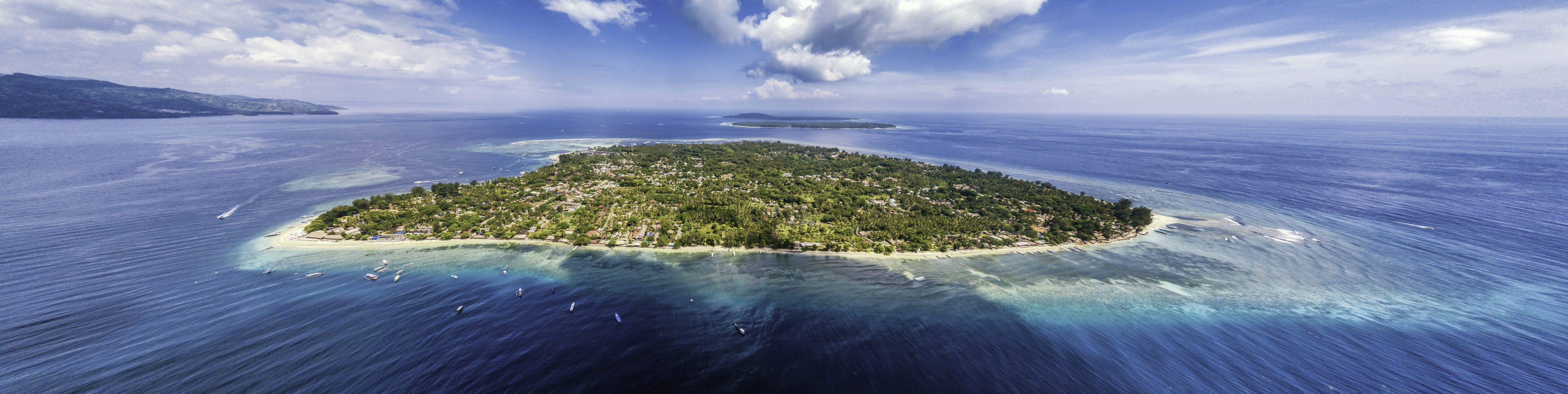 aerial photo of island under cloudy sky at daytime solomon islands teams background