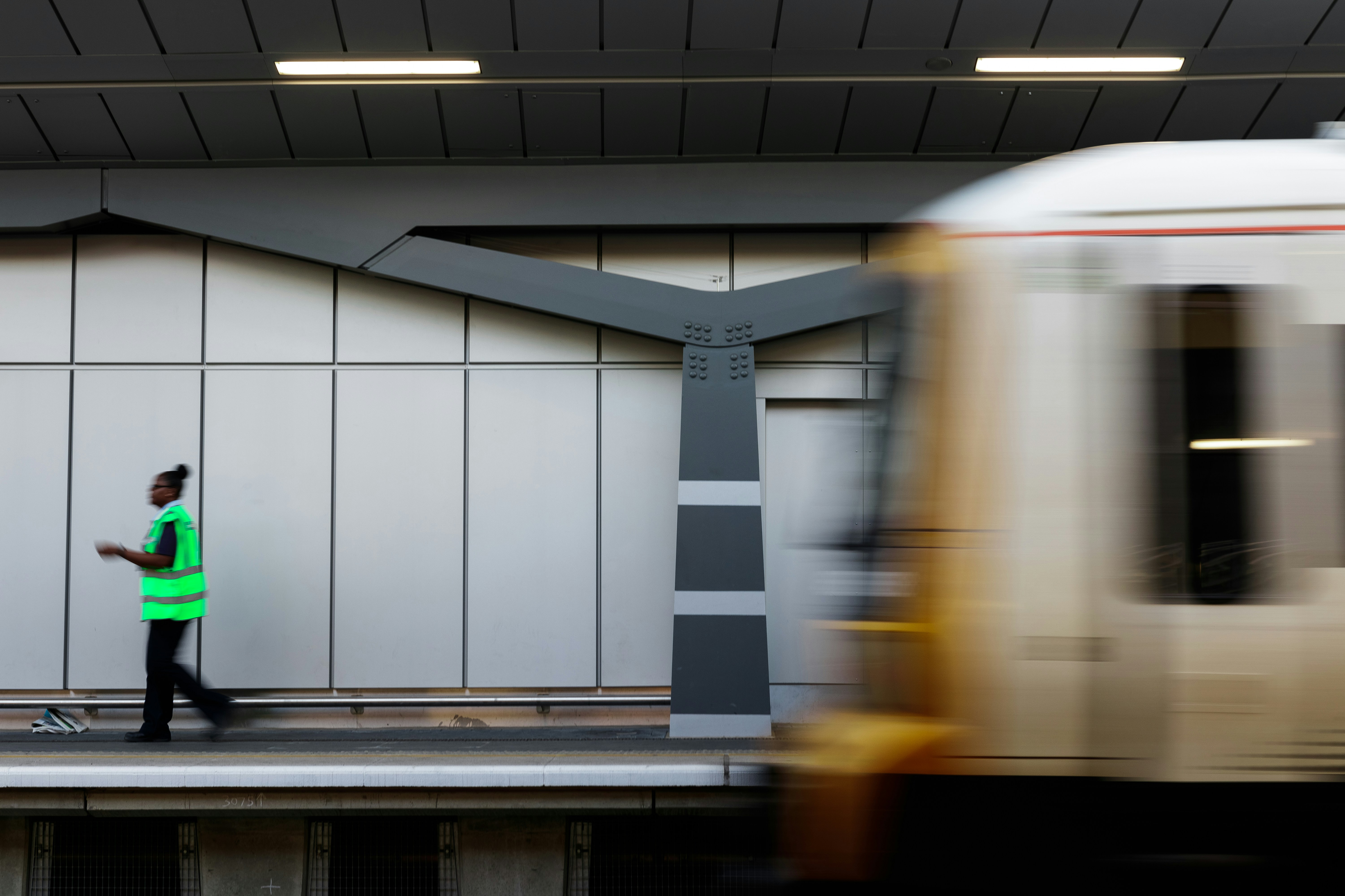 person walking on train station