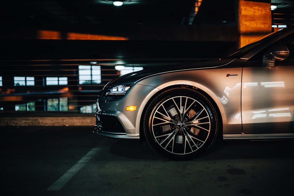 low-angle of silver car on road