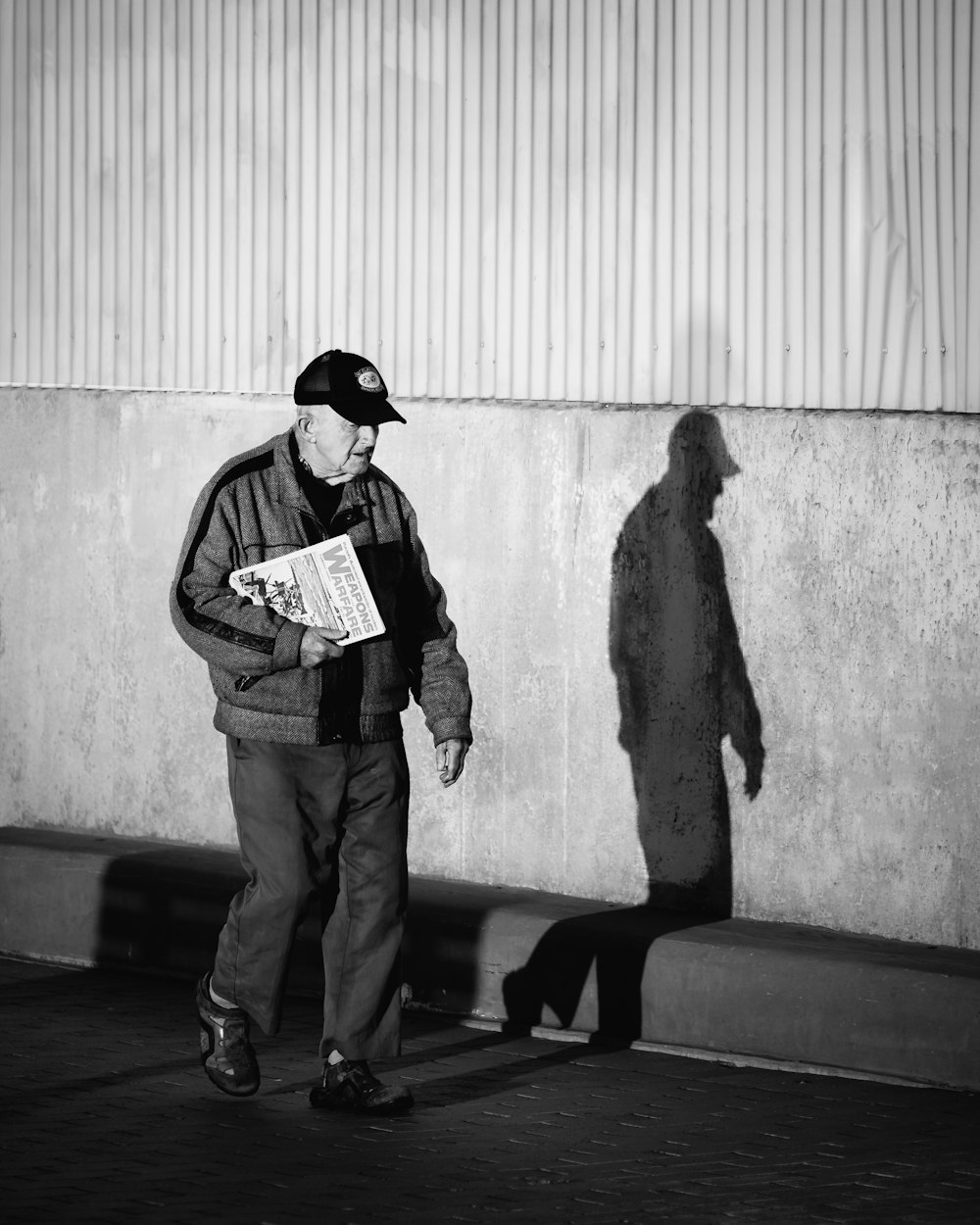 man walking on the sidewalk