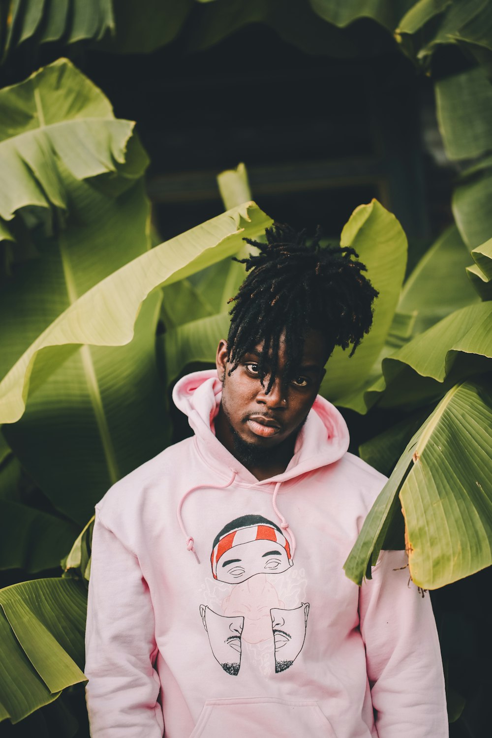 man wearing pink hoodie