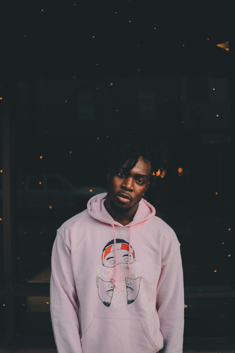 man in pink pullover hoodie