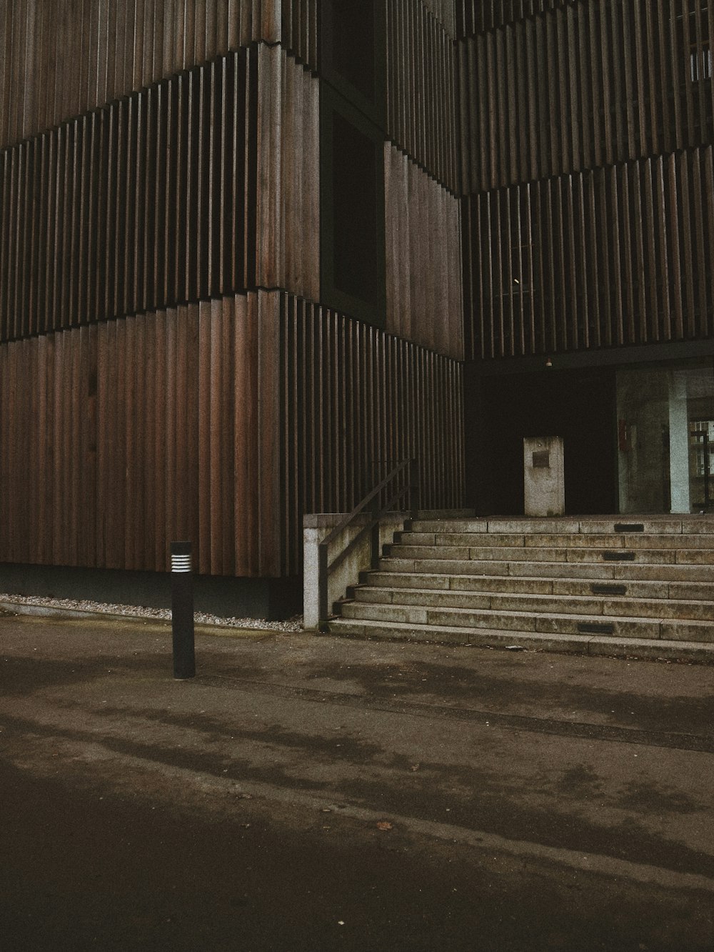 grey concrete stairs heading to building