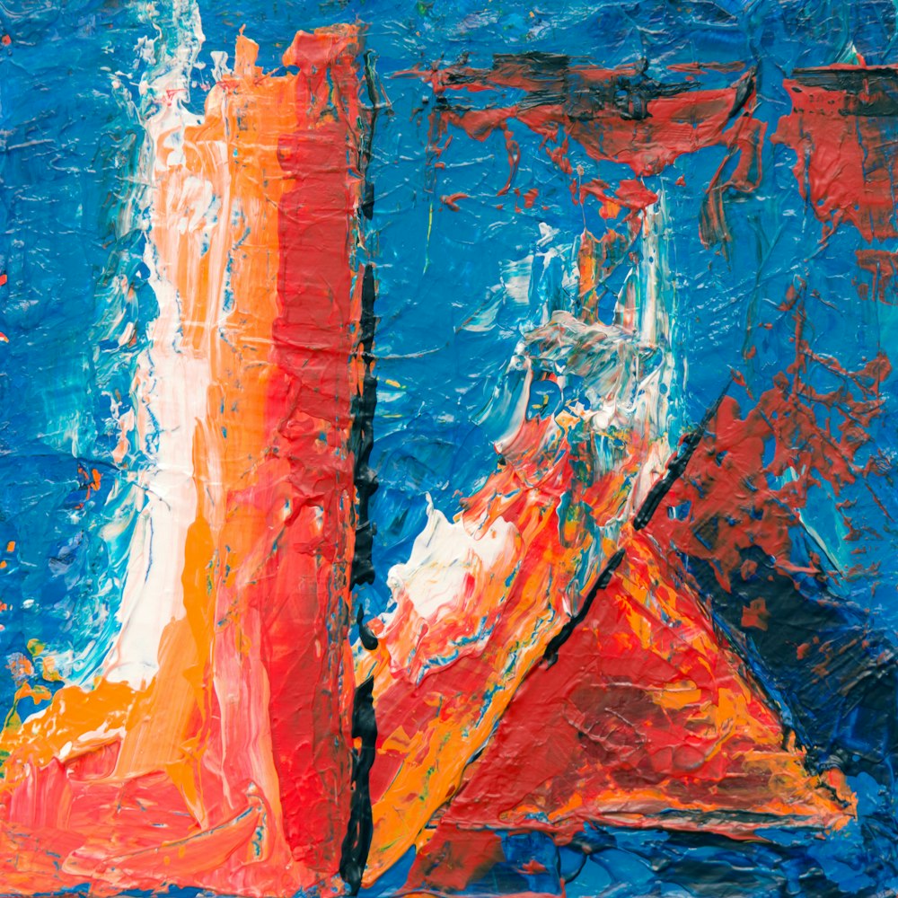 blue red and white abstract painting