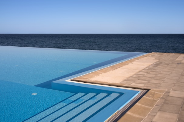 An infinity pool blending seamlessly with the horizon on Chios Island.