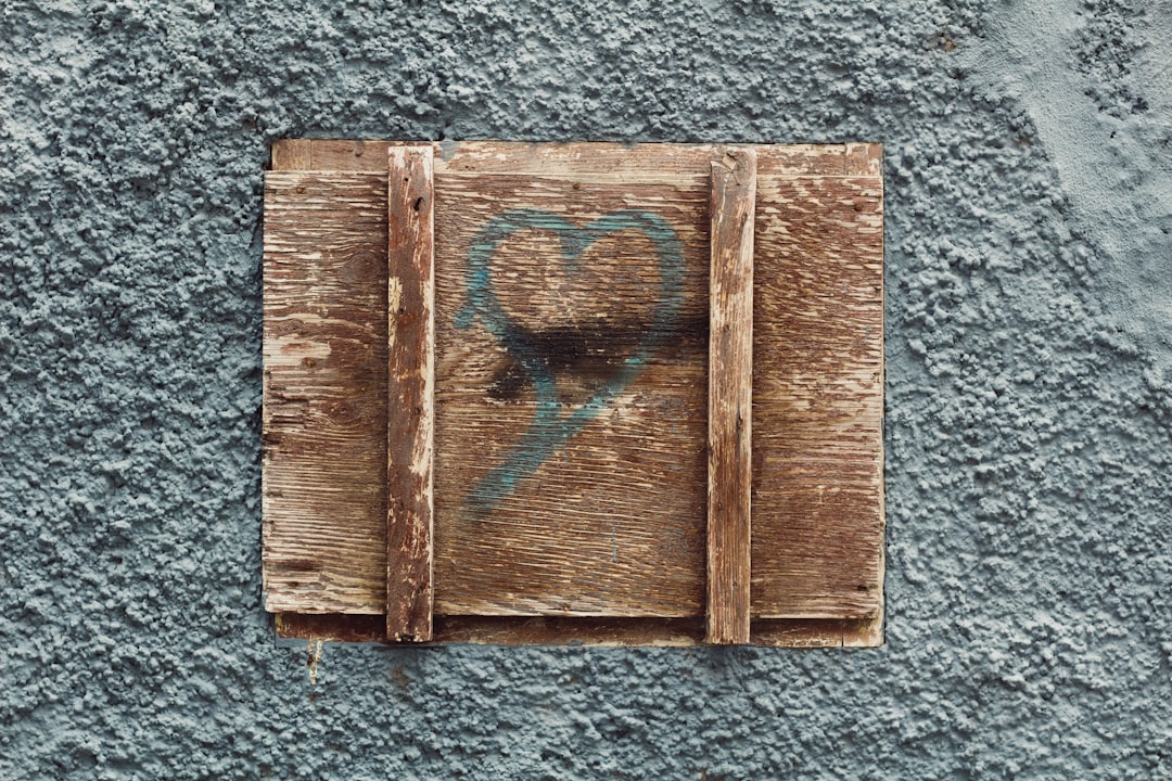 brown board on gray concrete wall