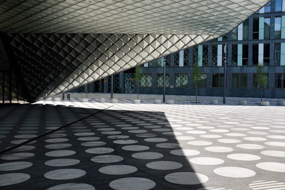 a large building with a large amount of dots on the floor