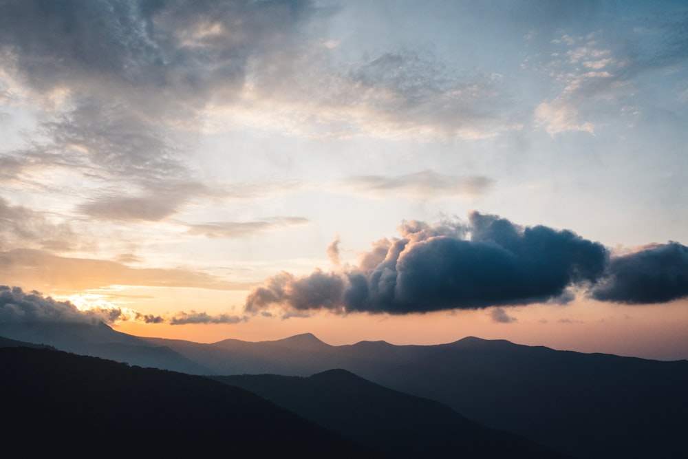 scenery of silhouette of mountains during daytime