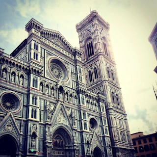 Sunlight casting shadows on the ornate facade of Puebla's historic cathedral.