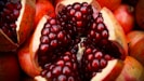 close-up photo of sliced pomegranate