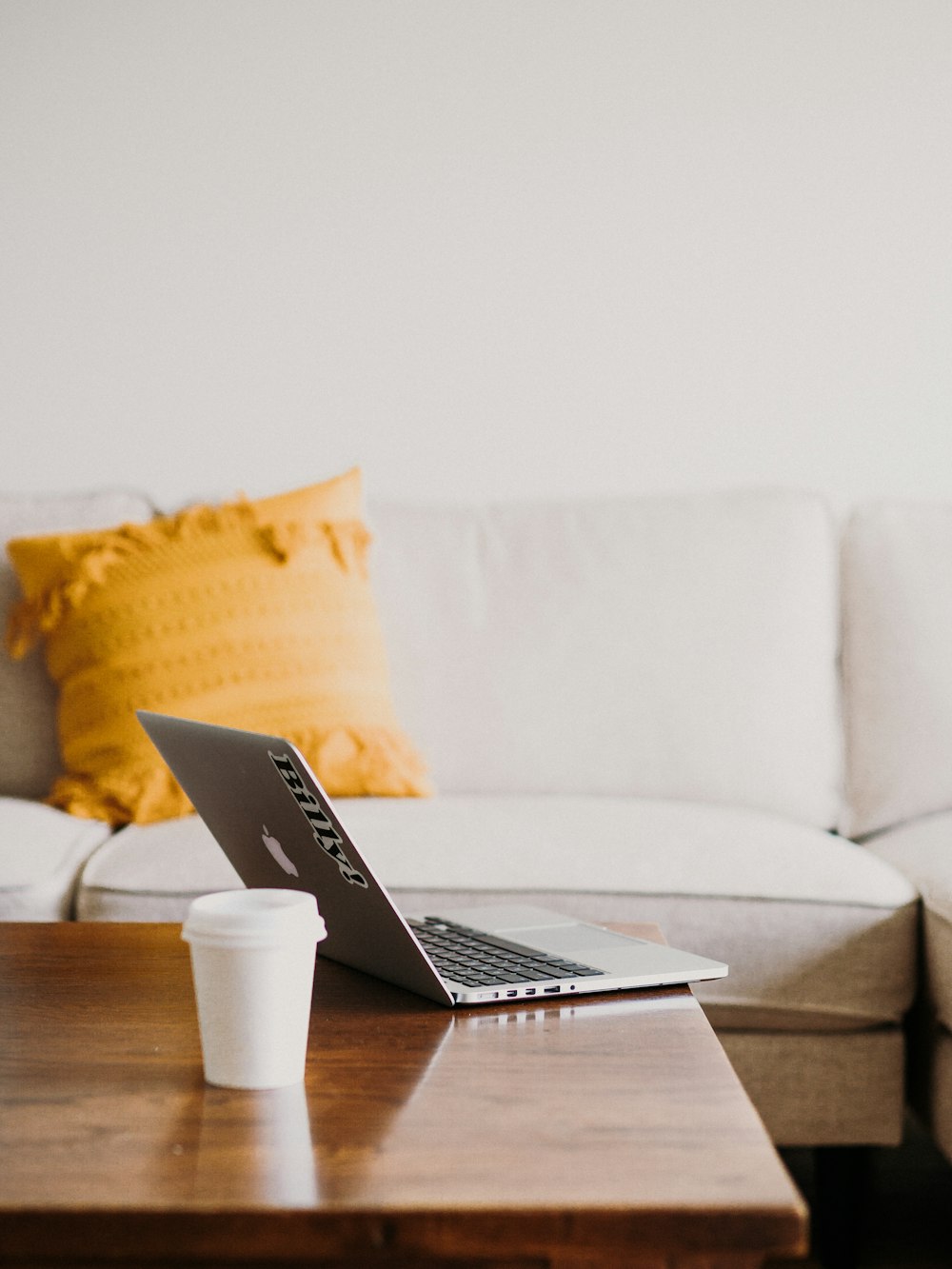 MacBook on coffee table