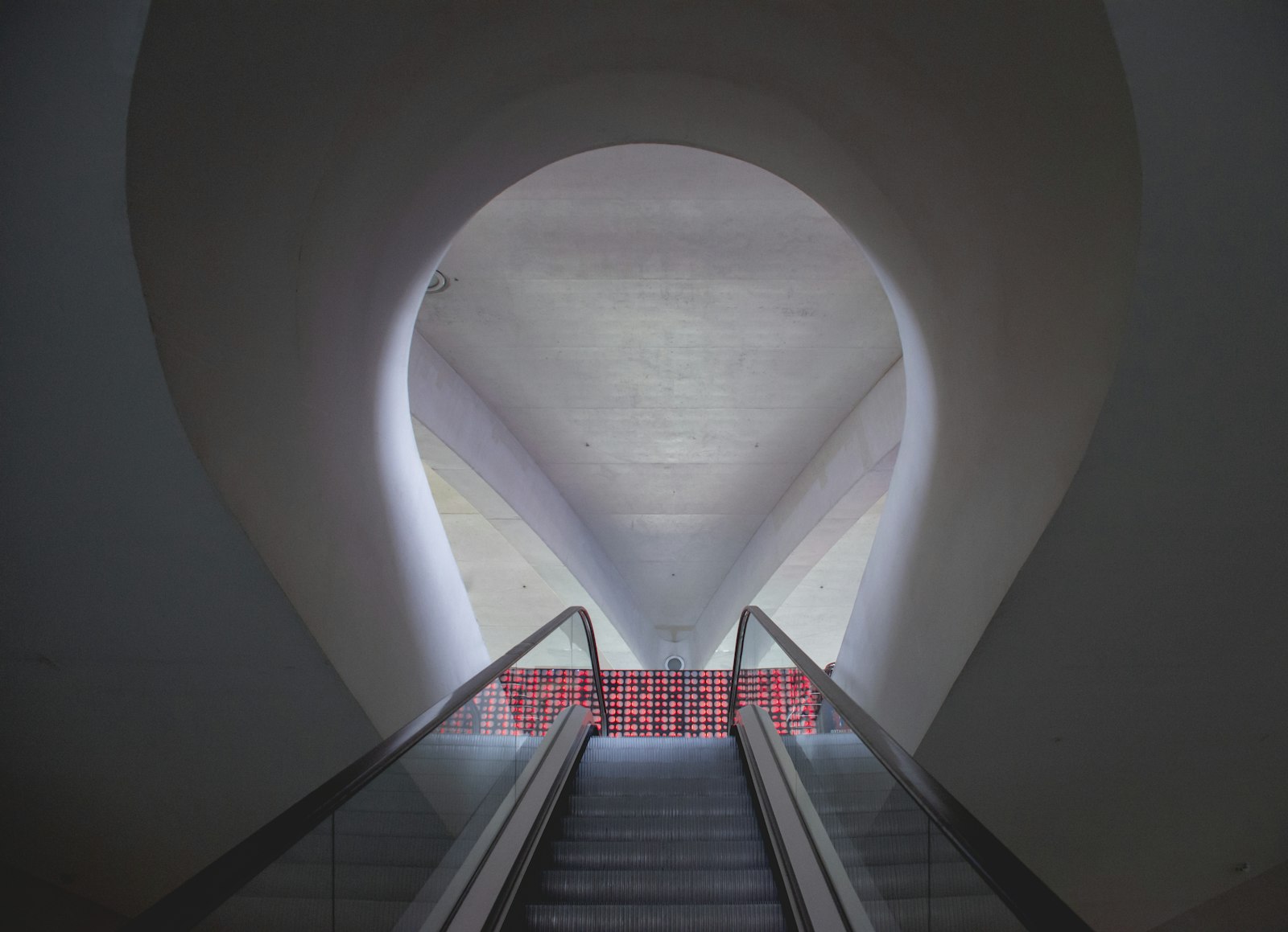 Nikon AF-S DX Nikkor 18-300mm F3.5-5.6G ED VR sample photo. Escalator near wall photography