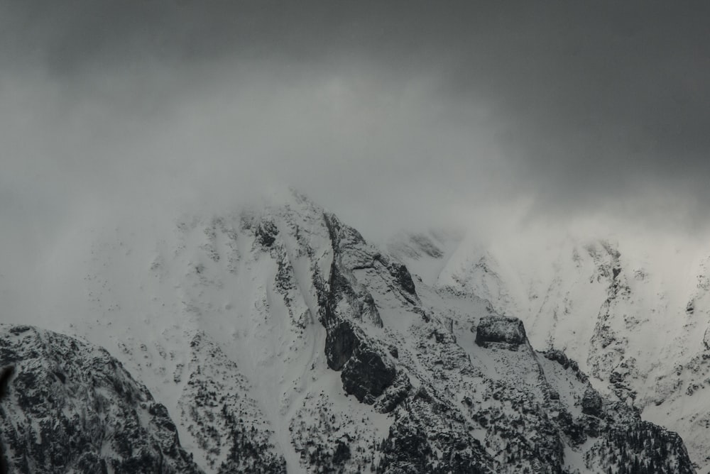 snow mountain under clouds