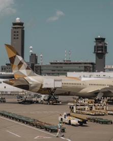beige airliner on airport