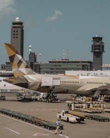 beige airliner on airport