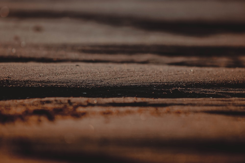 a close up of a wet surface with a blurry background