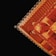 A close-up view of a traditional architectural structure, featuring intricate wooden beams and details painted in a vibrant orange, set against a stark black background. The image captures the geometric precision and craftsmanship of the design.