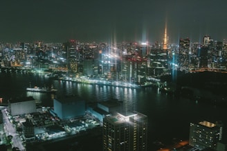 A sleek financial district skyline illuminated with flowing data streams and digital waveforms.
