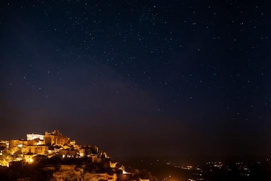 lighted building at night time in Gordes France