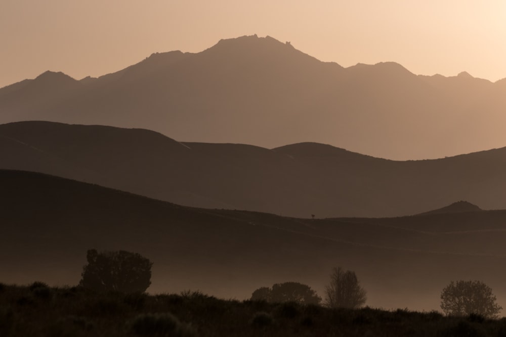silhouette of mountain during golden hour