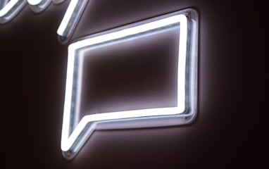 white neon light signage on wall