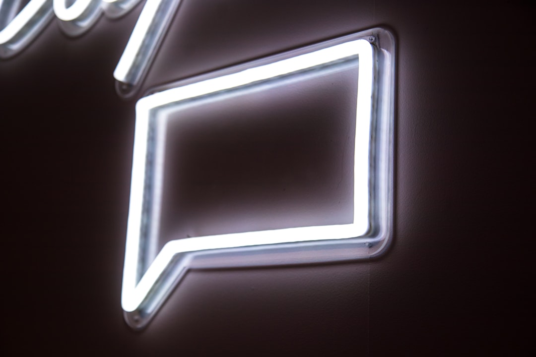 white neon light signage on wall,