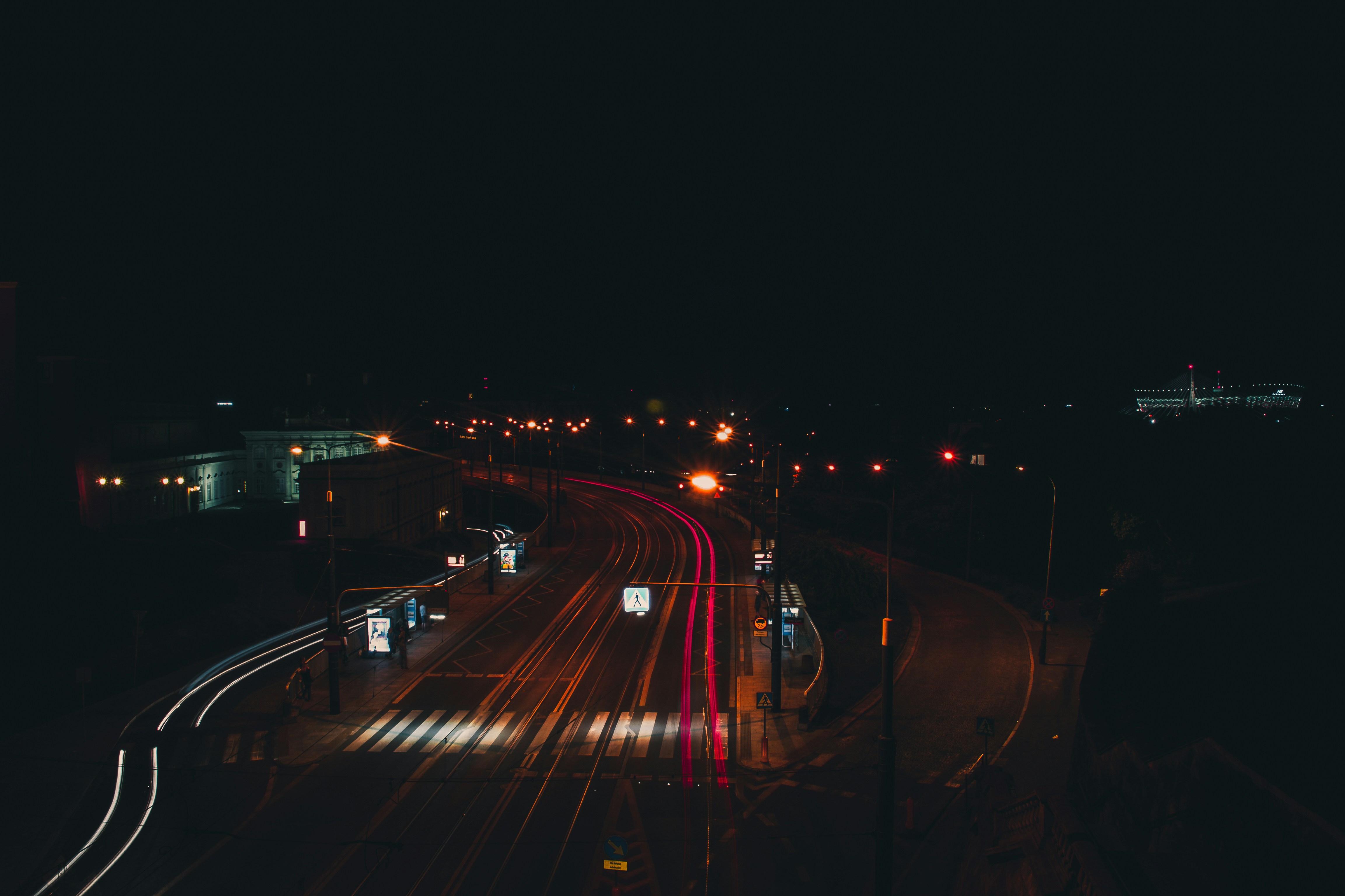 gray asphalt road way under night sky